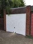 Hormann Horizontal white framed canopy with four point locking and garage door defender installed at Moorend Lane Thame, Thame Garage Doors - Your Local Garage Door Expert